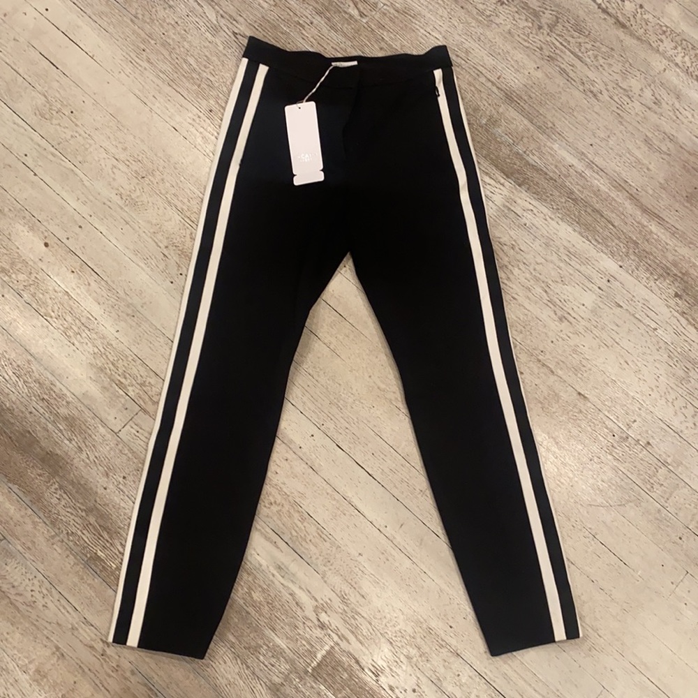 ESCADA SPORT BLACK PANTS WITH A WHITE STRIPES LOTS OF STRETCHY FABRIC. Size 34